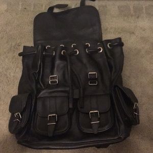 Saint Laurent Paris black lather backpack.